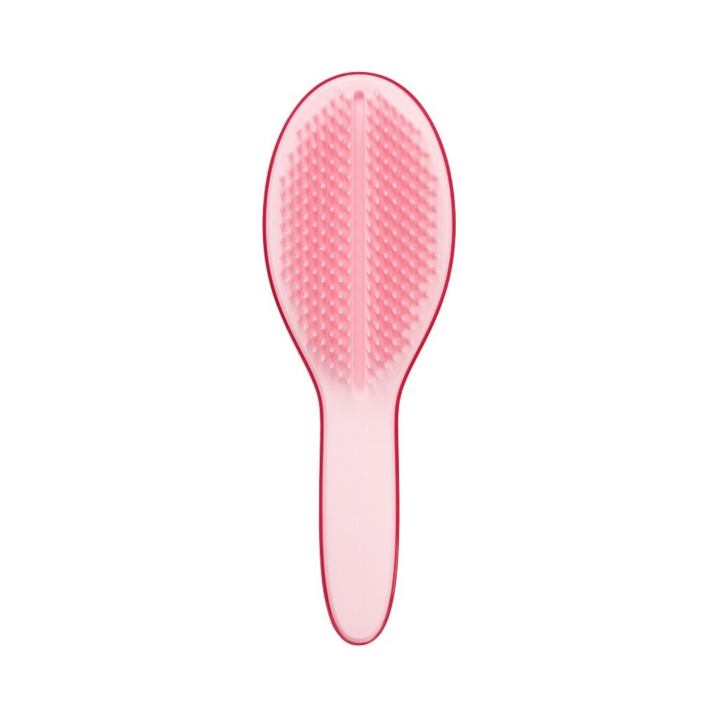 A pink hairbrush is shown against a white background.