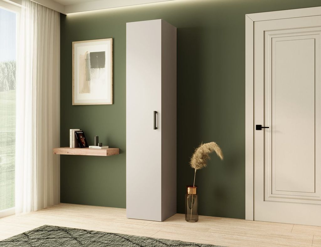 A tall, narrow cabinet is shown in a room with a green wall, a framed picture, a small shelf with books, and a door.