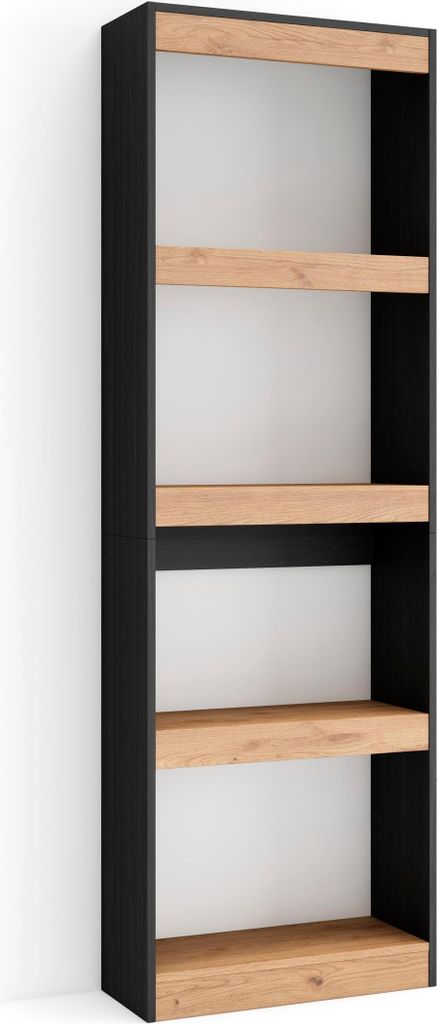 A tall, narrow bookshelf with black sides and light wood shelves against a white wall.