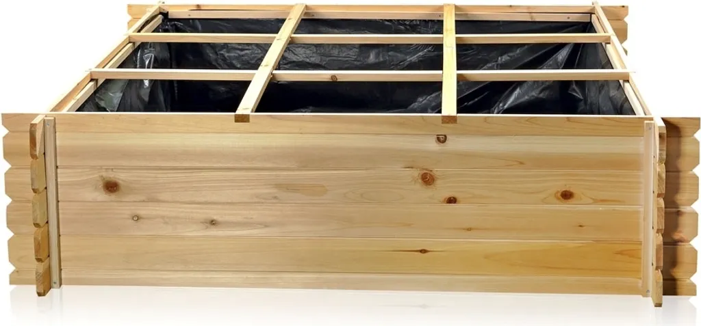 Lit surélevé en bois d'épicéa avec film noir pour potager et herbes