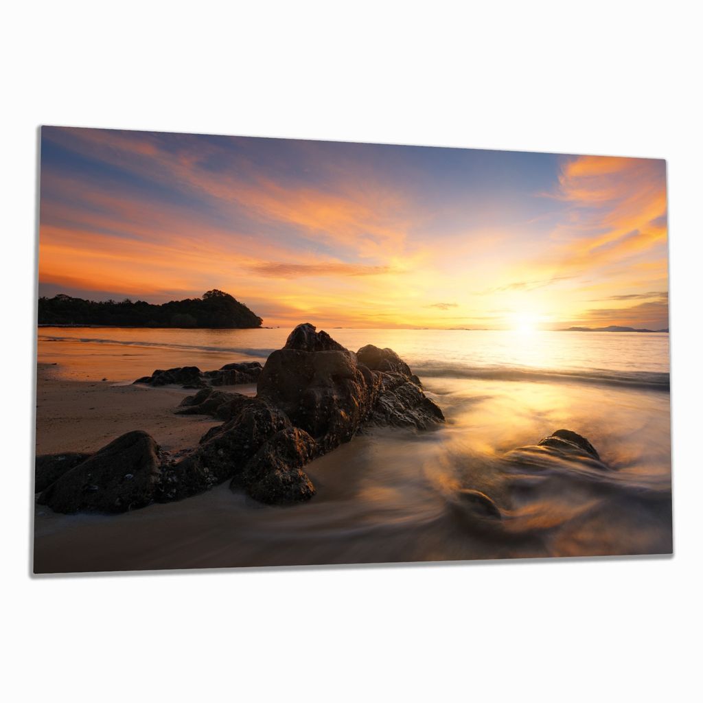 Wallario Herdabdeckplatte aus Glas, Größe 80 x 52 cm 1-teilig, Motiv Sonne über dem Meer mit Felsenlandschaft