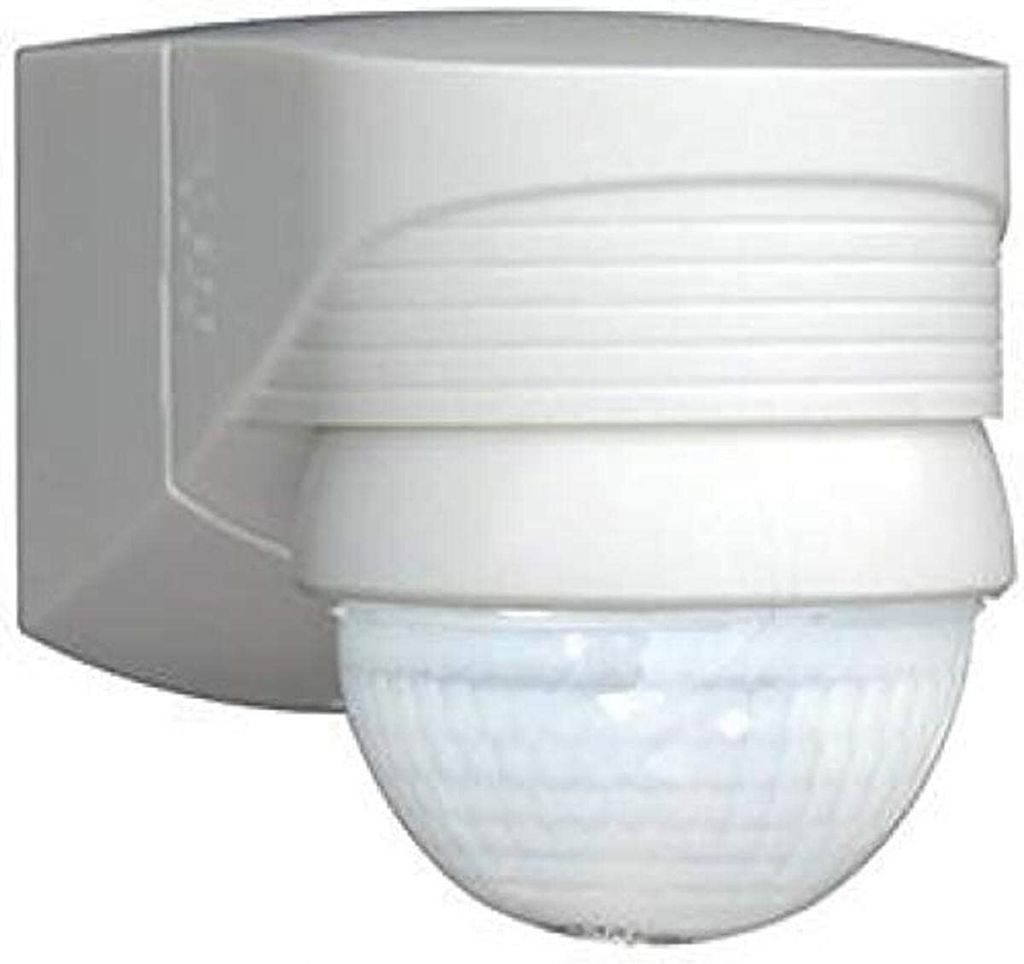 A white motion sensor mounted on a wall.