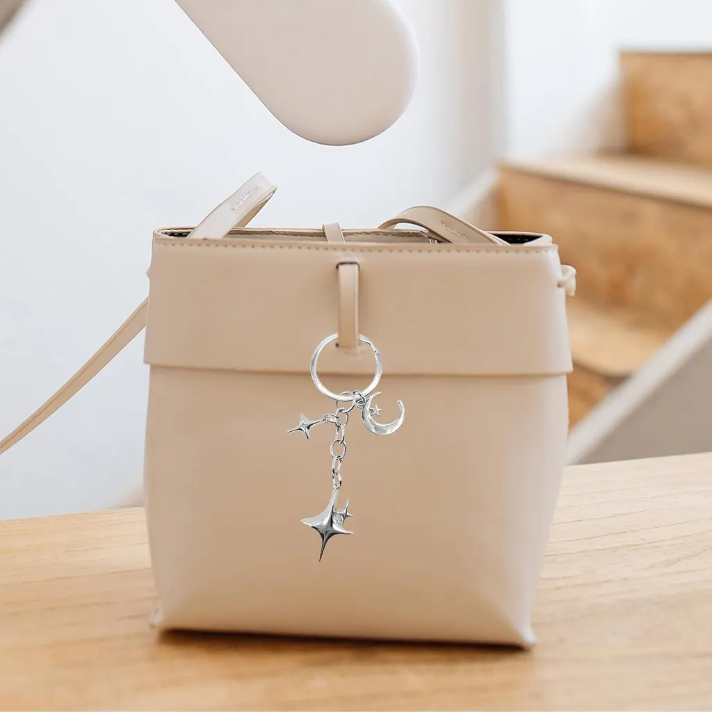 Porte-clés étoile et lune en acier inoxydable argenté - Design Céleste