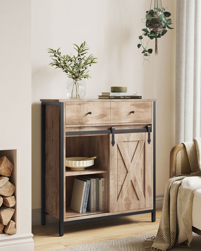 A wooden cabinet with black metal accents in a room setting.