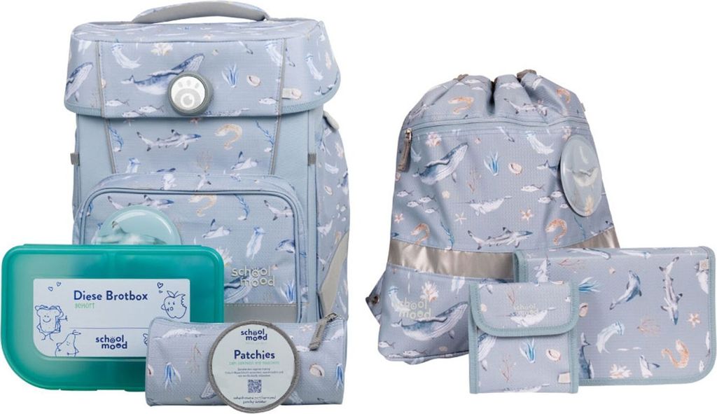 A school backpack set with a lunchbox and pencil case, all featuring a blue and white whale and feather pattern.