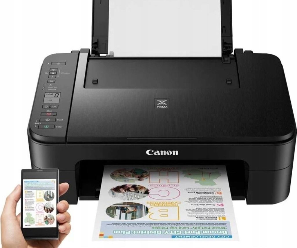 A black Canon Pixma TS3350 printer is shown with a printed document coming out of it, and a hand holding a smartphone next to it.