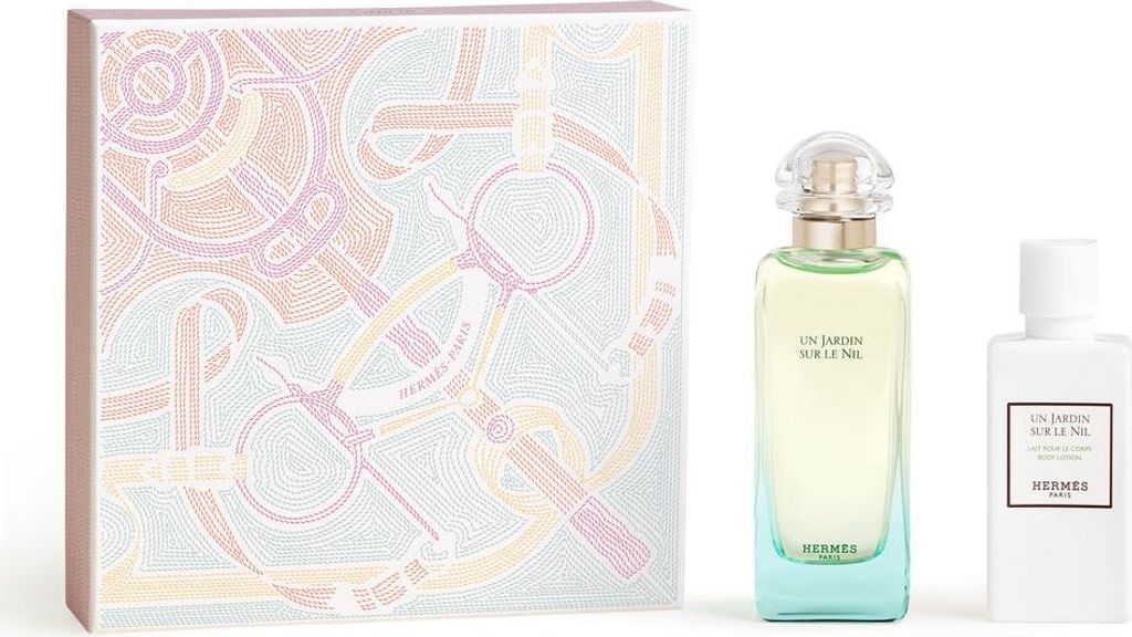 A gift set of Hermès perfume and lotion with decorative packaging.