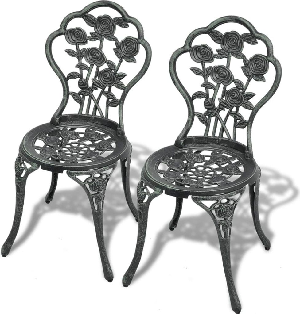 Two ornate, dark gray cast aluminum bistro chairs with rose motifs are displayed against a white background.