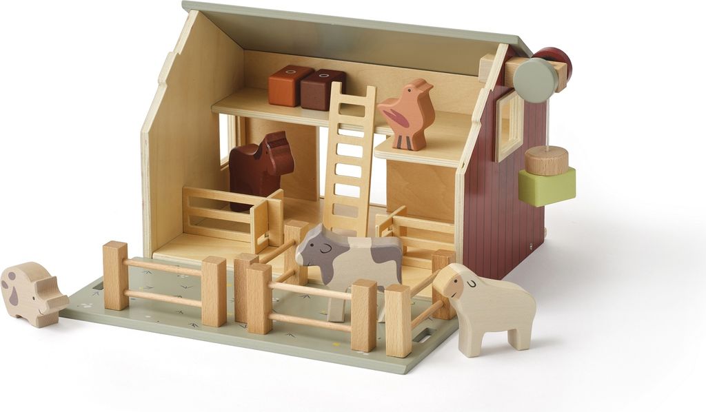 A wooden toy farm with farm animals and accessories.