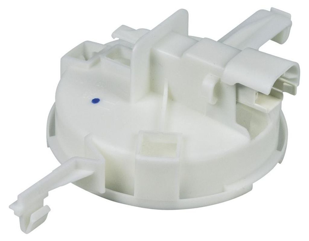 A white plastic component for a dishwasher.