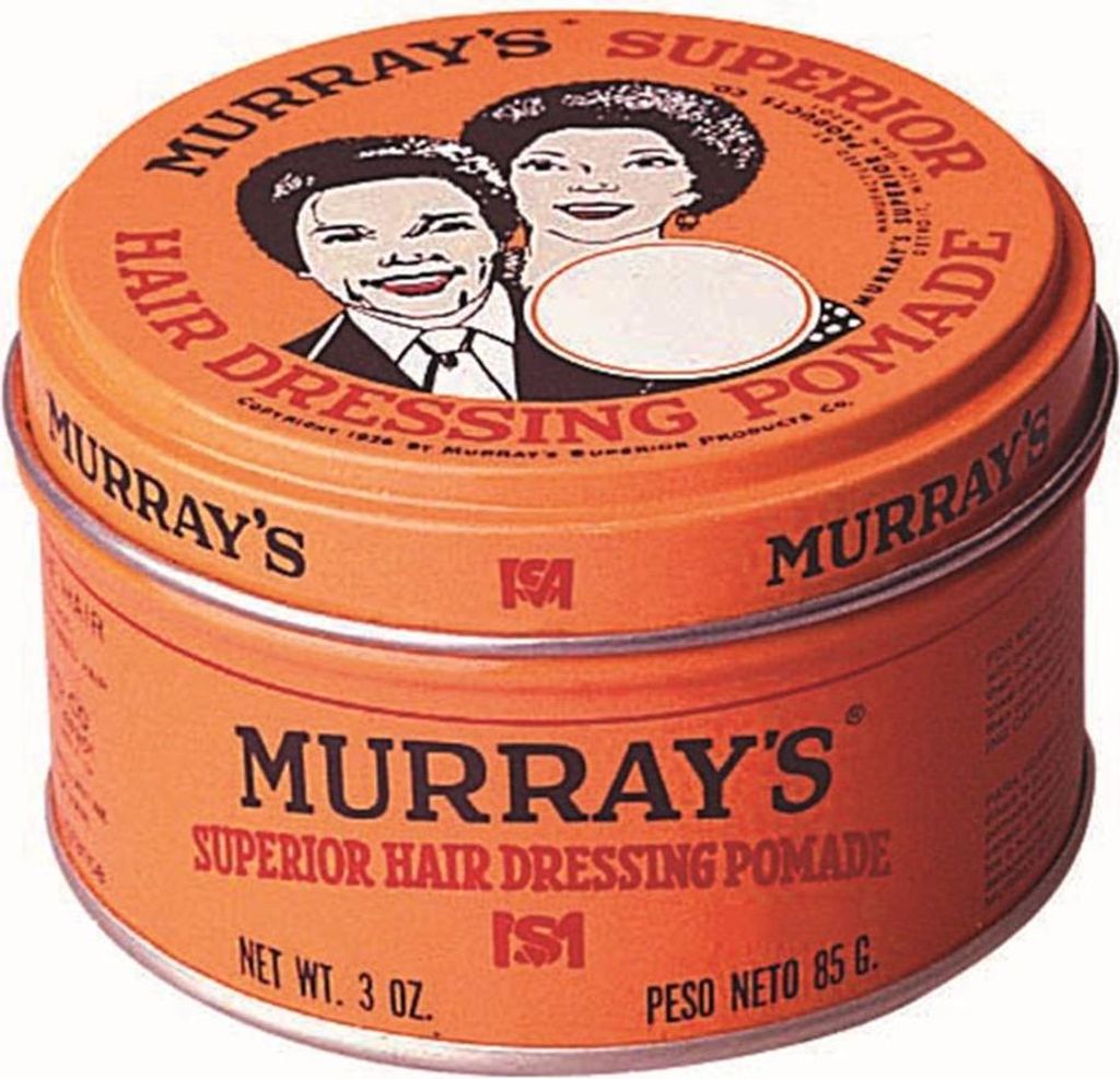 A close-up, slightly angled view of a vintage tin of Murray's Superior Hair Dressing Pomade.