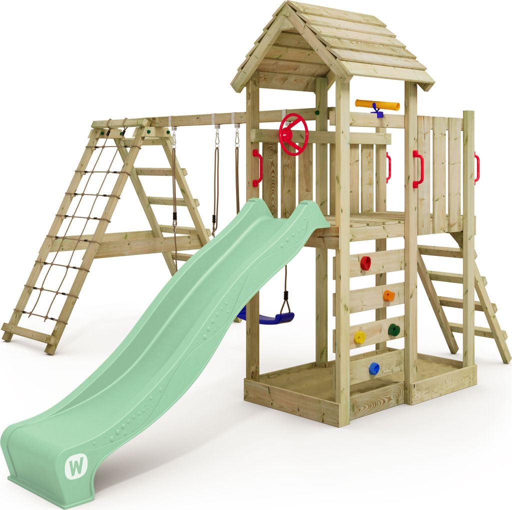 A wooden playground set with a slide, swings, climbing wall, and sandpit, presented against a white background.