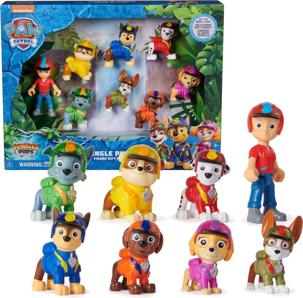 A gift set of Paw Patrol Jungle Pups action figures, displayed in and around their packaging.