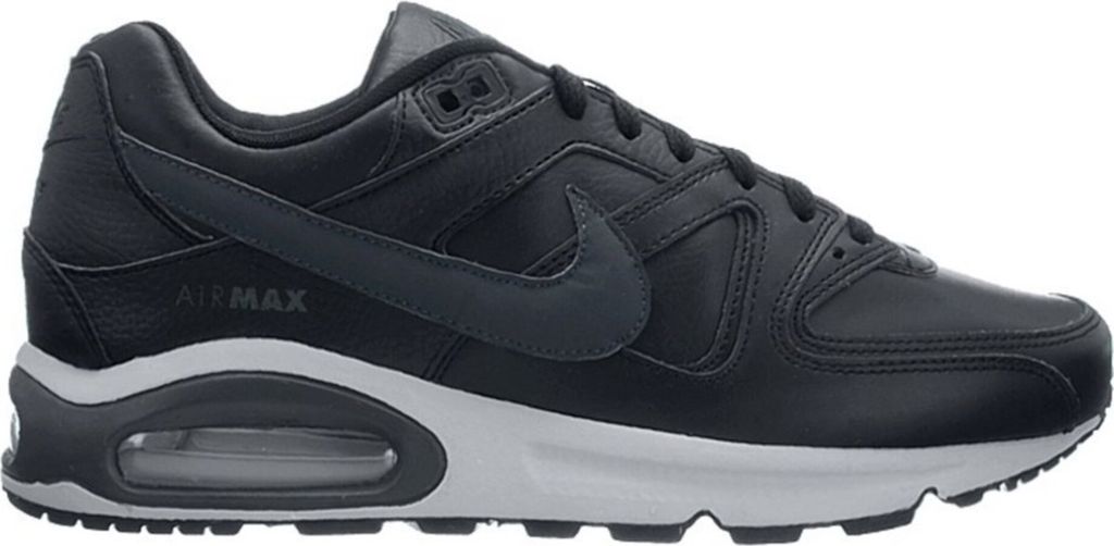 A side view of a black Nike Air Max Command leather sneaker on a white background.