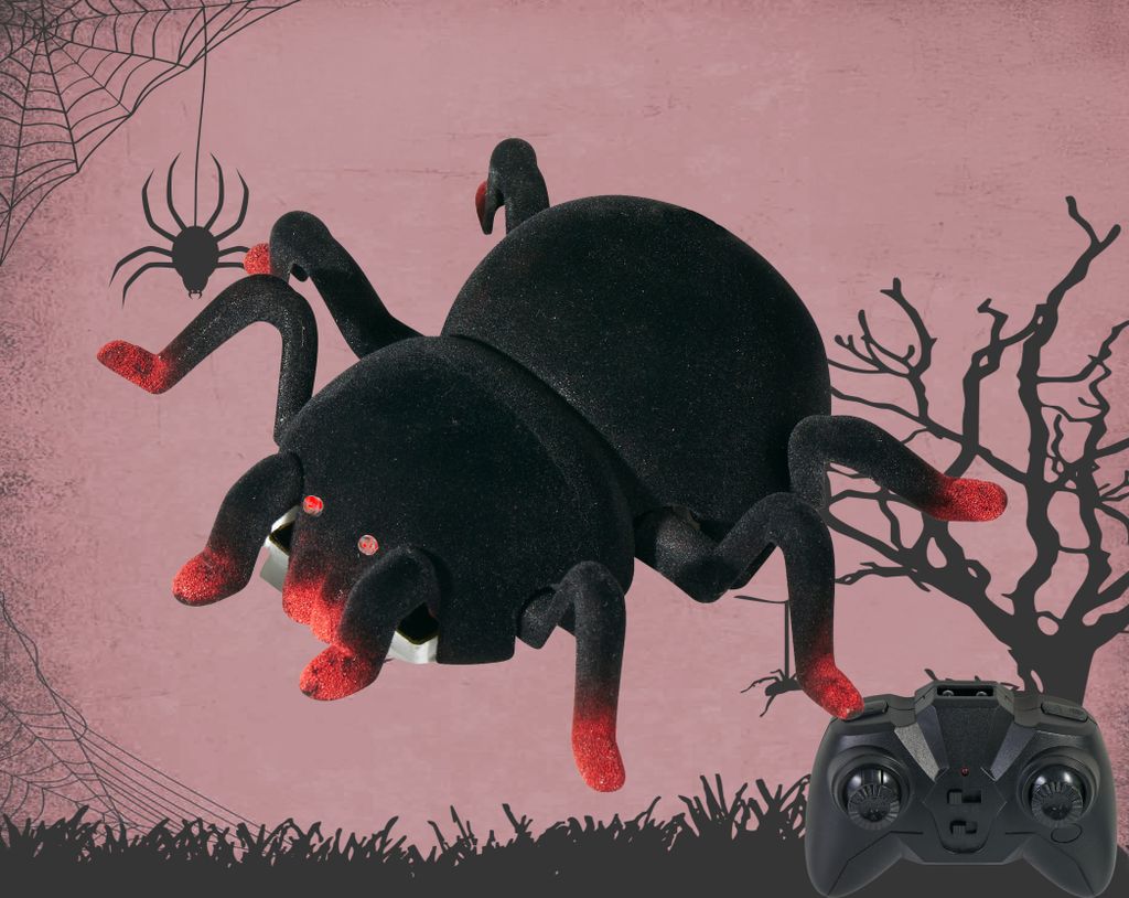 A remote-controlled spider toy with a Halloween-themed background, including a spider web and a bare tree silhouette. A remote control is visible in the foreground.