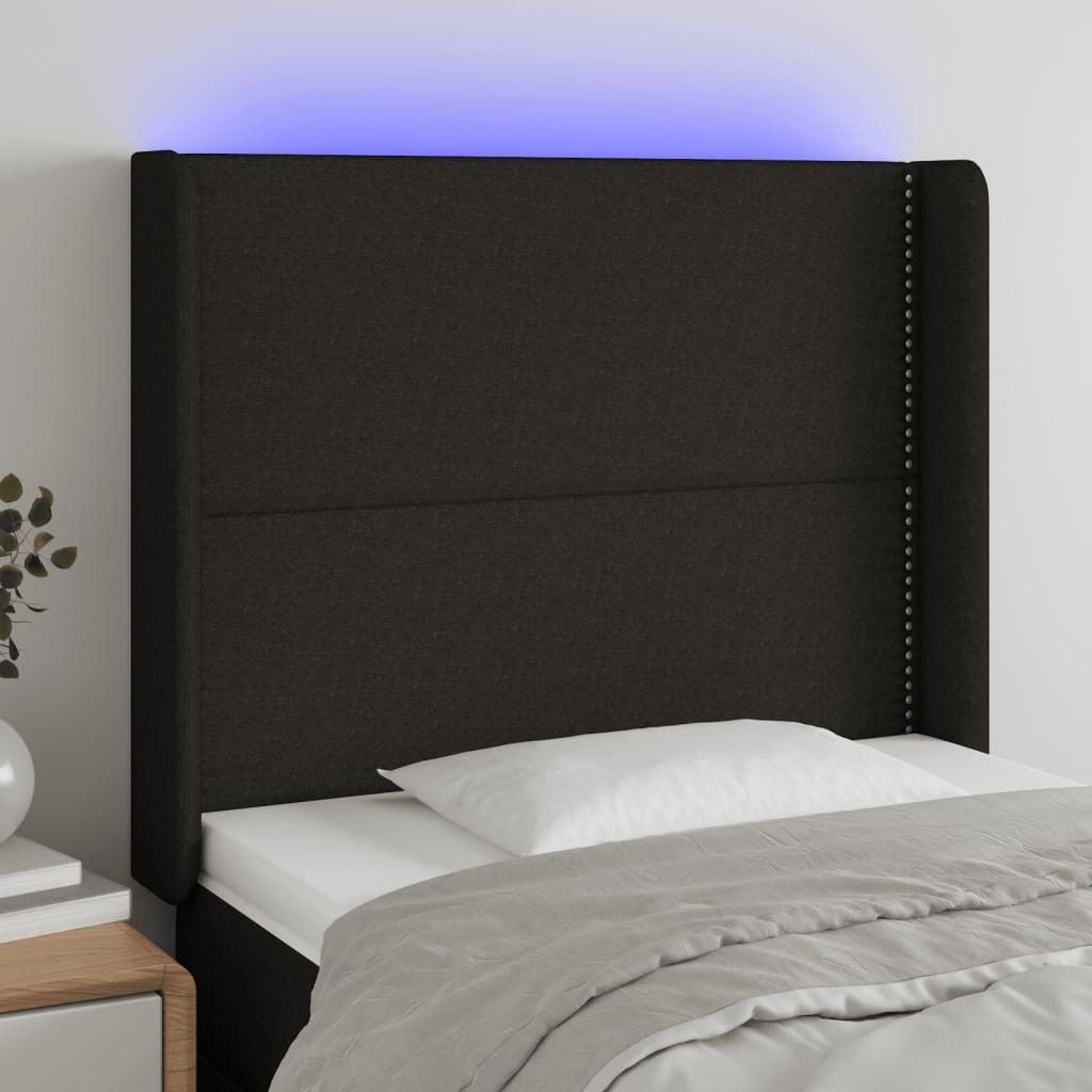 The Living Store LED Kopfteil Schwarz 83x16x118/128 cm Stoff