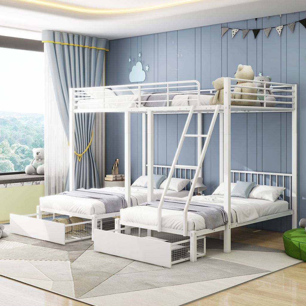 A children's bedroom with a white metal bunk bed, featuring multiple beds and storage drawers, set against a blue wall with decorative flags and a window with blue curtains.
