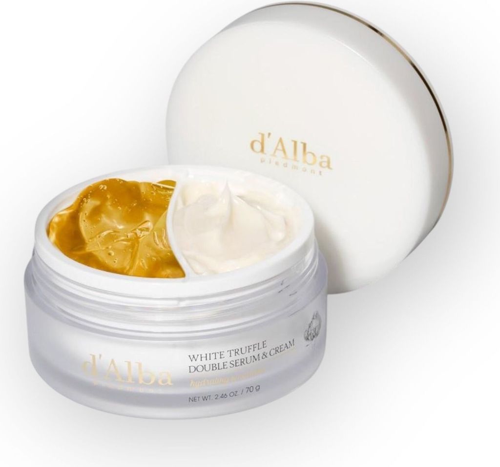 A d'Alba White Truffle Double Serum & Cream jar with the lid open, showing two distinct compartments of product.