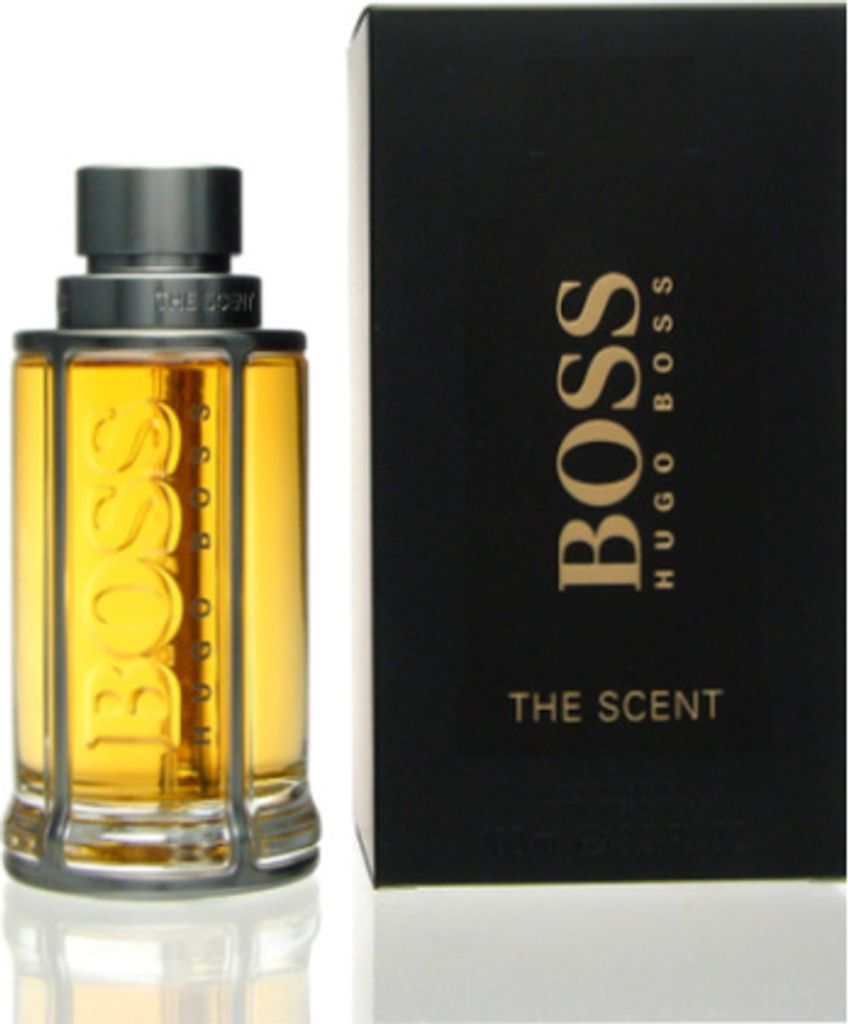 A bottle of Hugo Boss The Scent Eau de Toilette for Men and its packaging are displayed side-by-side on a white background.