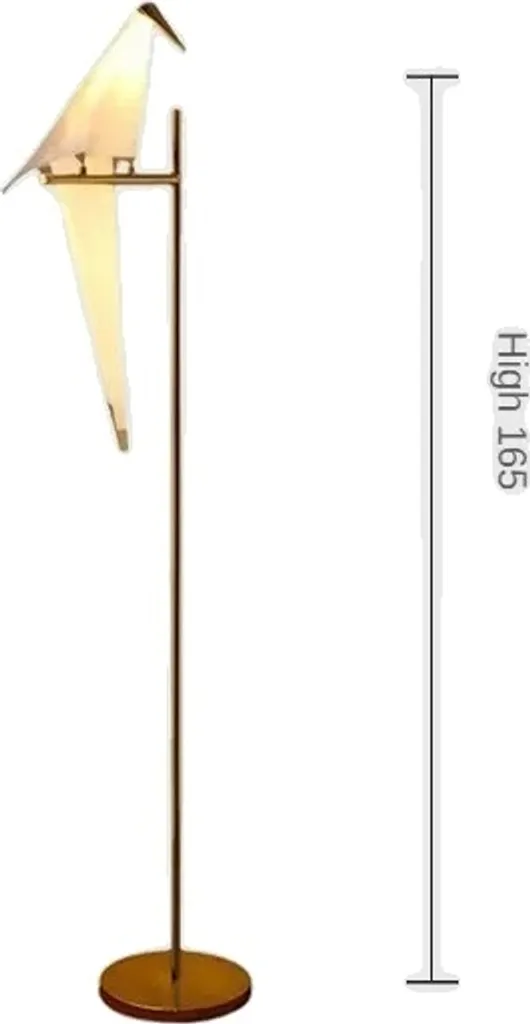Lampadaire oiseau LED doré pour éclairer un salon sombre design chic