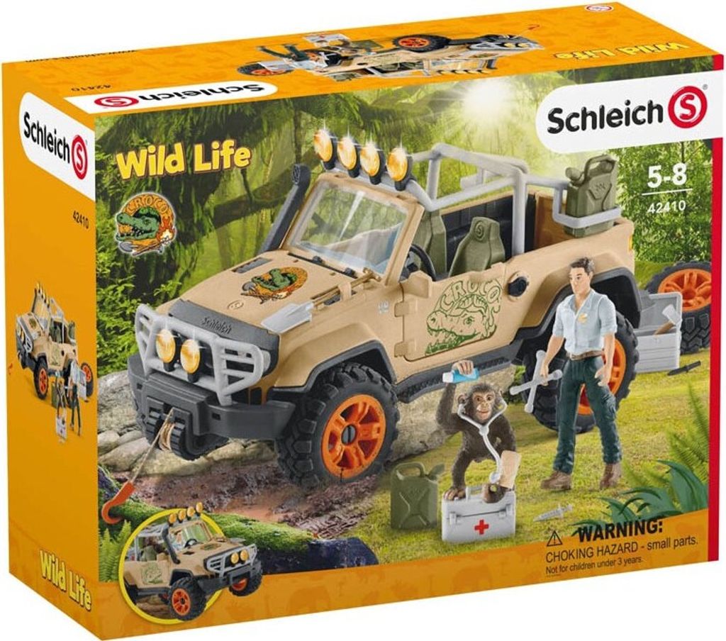 A toy playset of a safari jeep with figures and accessories, presented on its retail packaging.