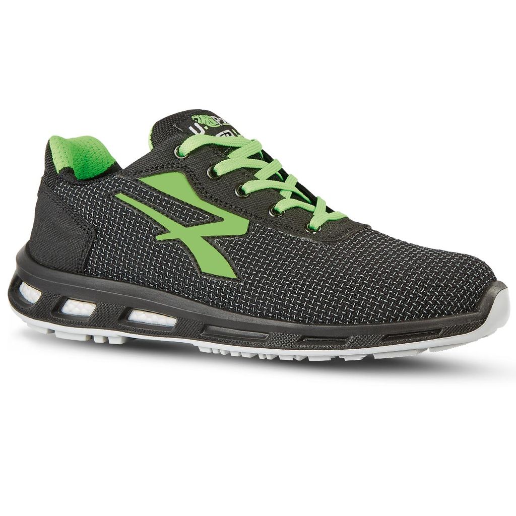 A single black and green safety shoe is shown against a white background.