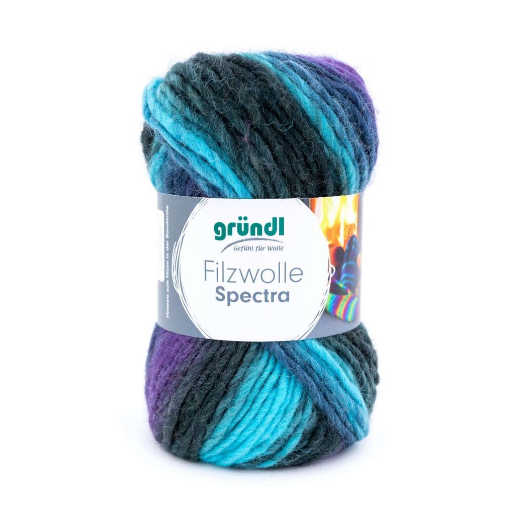 A ball of multicolor yarn on a white background.