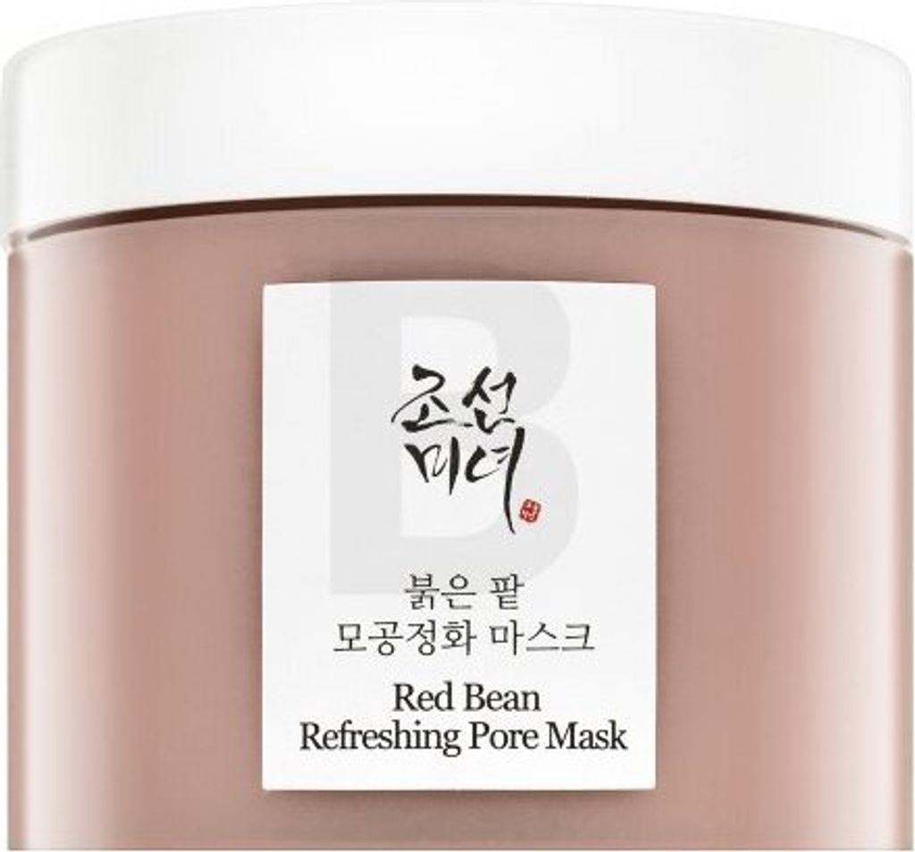 A close-up of a skincare product jar with its label.