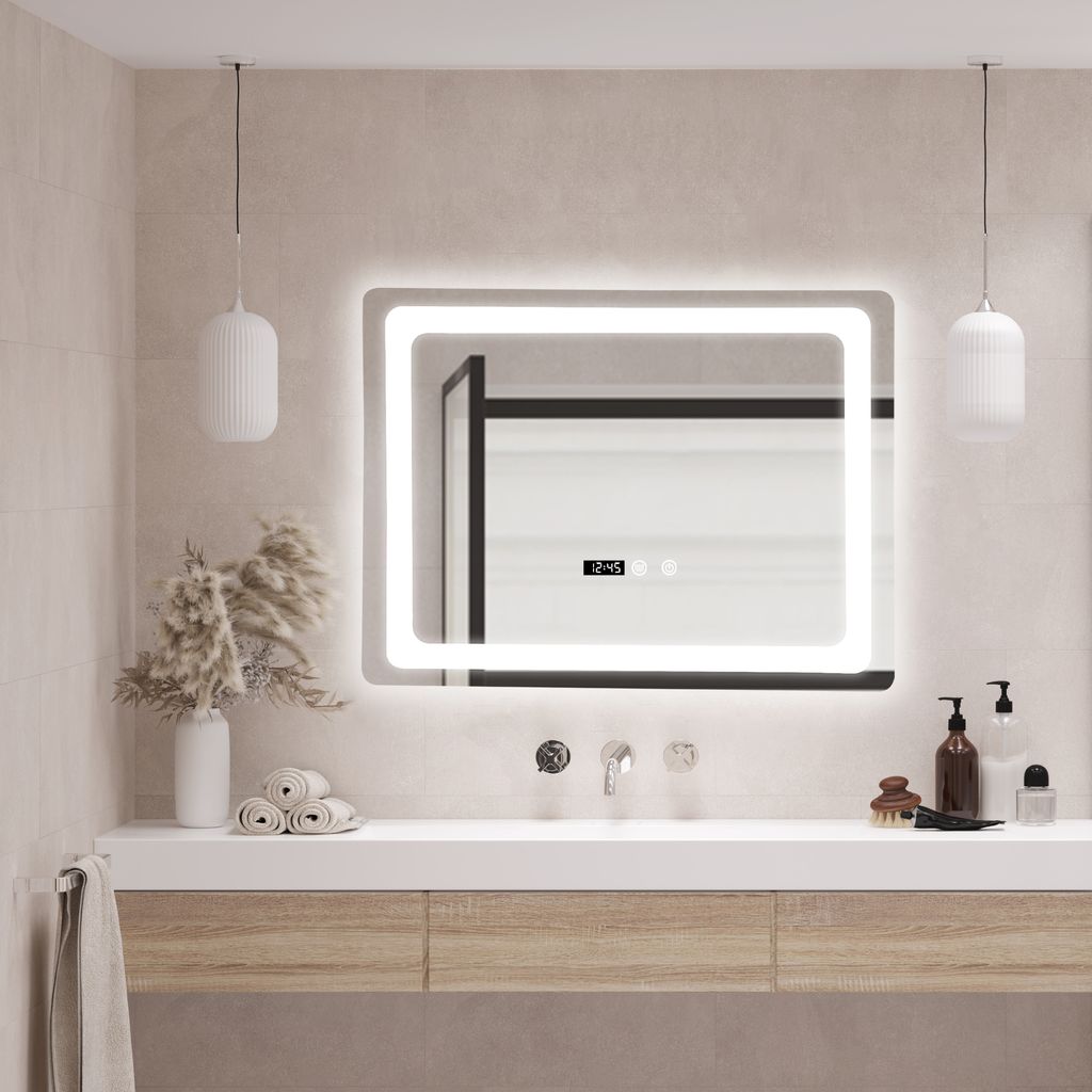 A modern bathroom vanity with a sink, faucet, and a large LED-lit mirror above it. The mirror has a digital display showing the time.