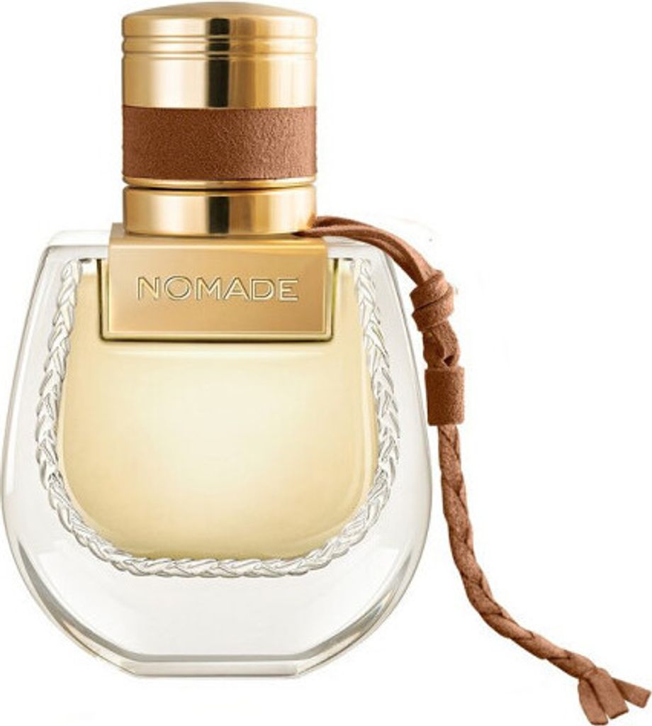 A close-up studio shot of a Chloé Nomade perfume bottle.