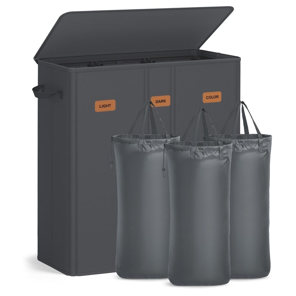 A dark gray laundry hamper with three compartments and three removable laundry bags.