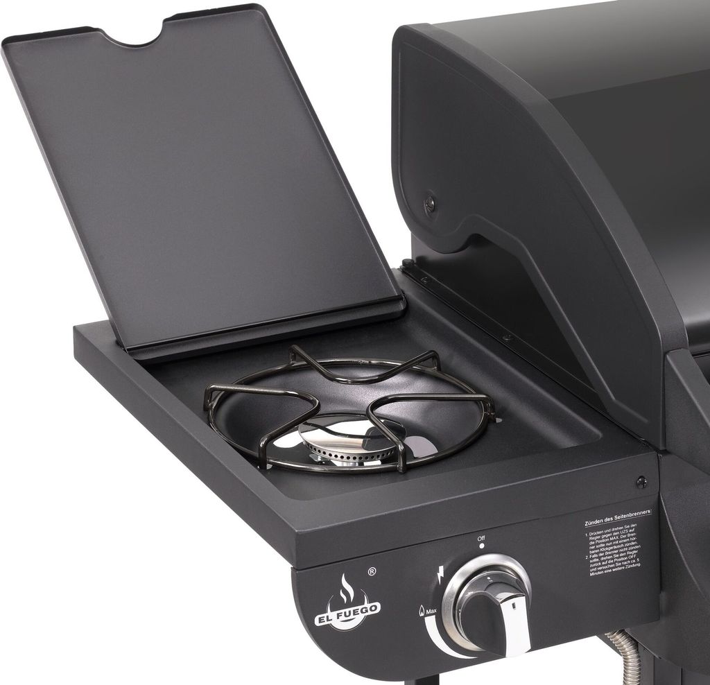 A close-up view of a gas grill's side burner and control panel.