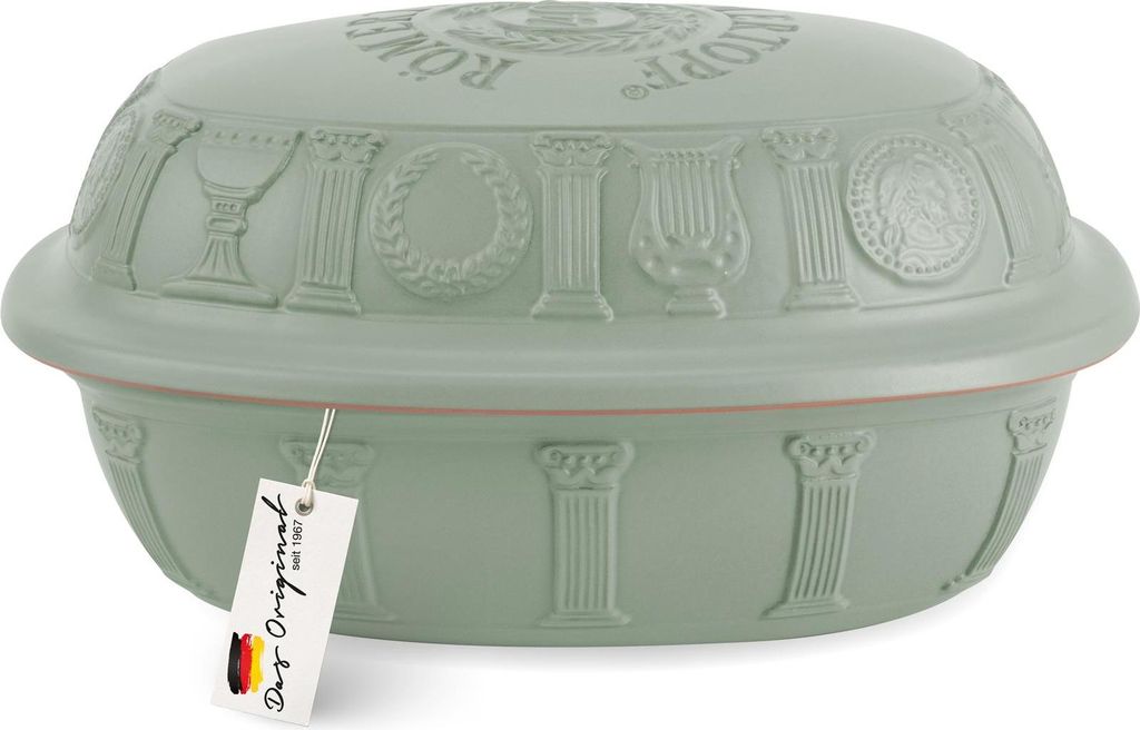 A green ceramic Römertopf casserole dish with a lid, decorated with Roman-inspired motifs.