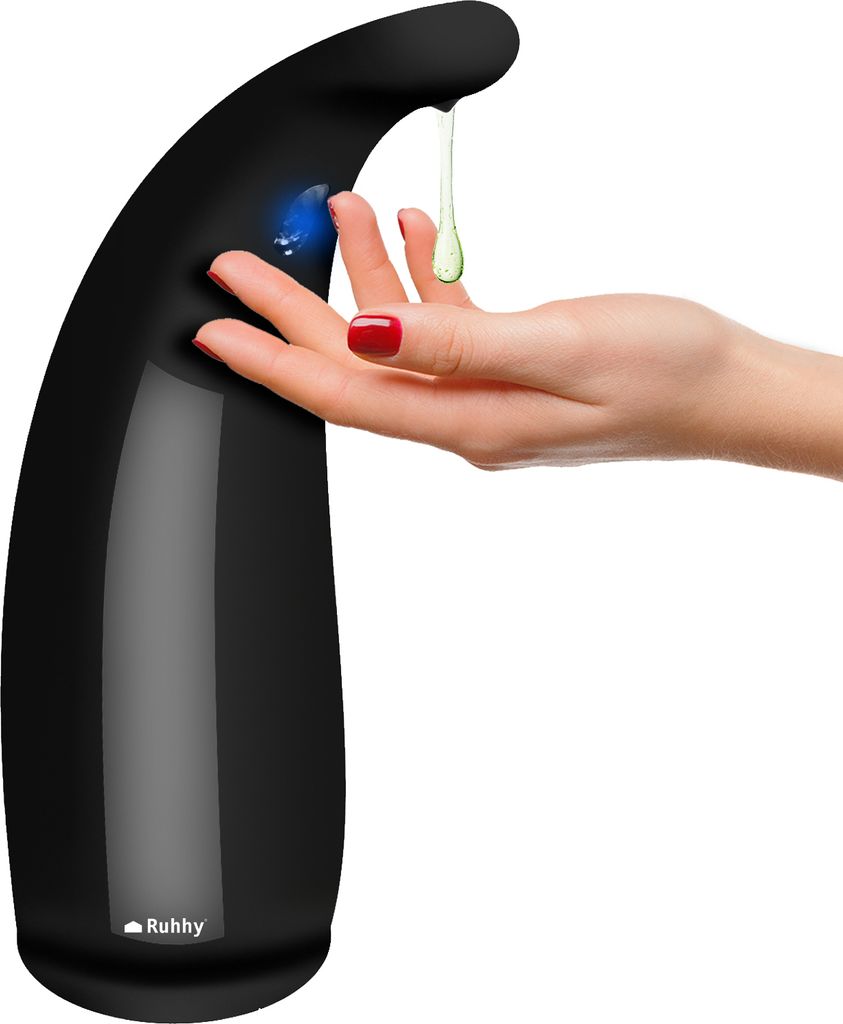 A hand is being presented to a black automatic soap dispenser to receive soap.