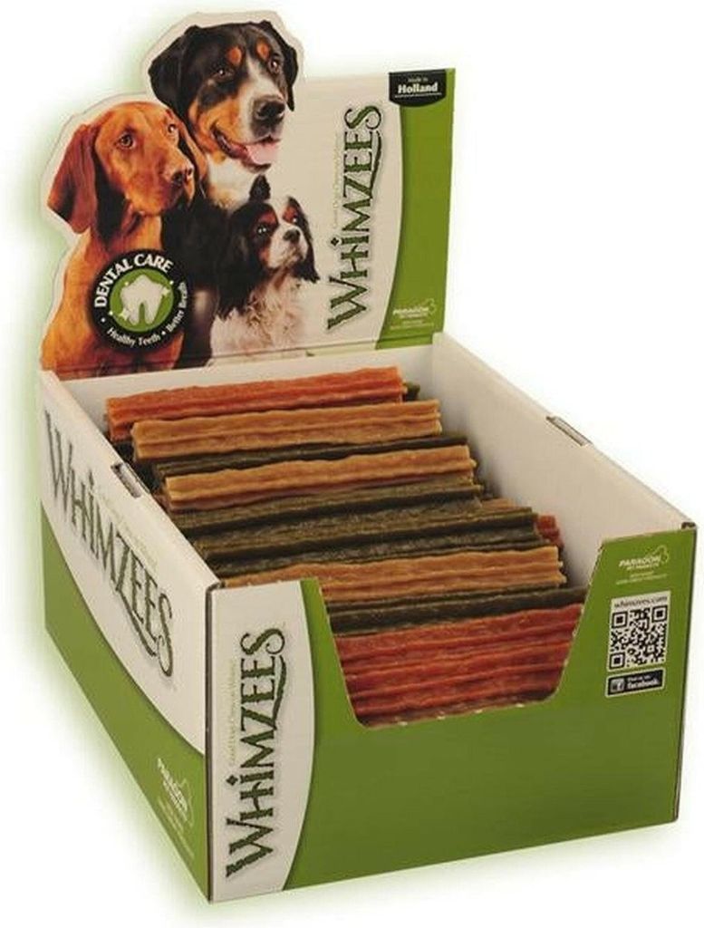 A display box filled with dog treats, with a cardboard cutout of dogs on top.