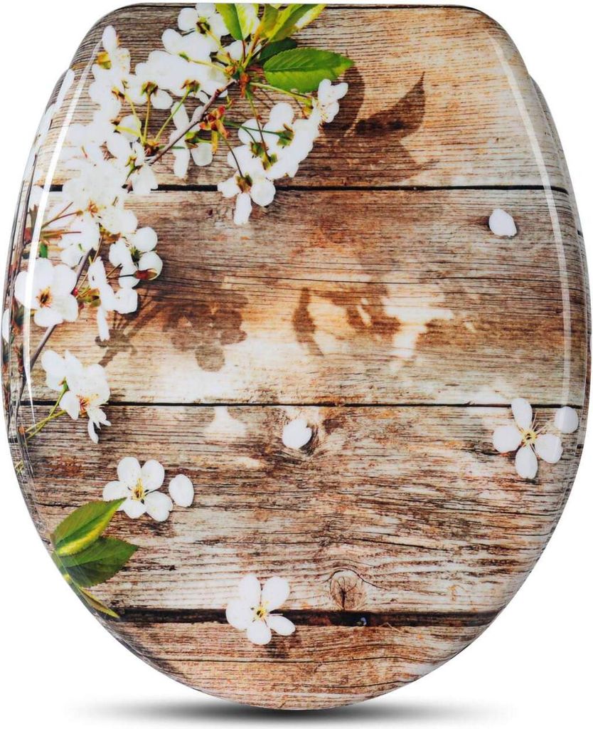 A toilet seat with a floral pattern on a wooden background.