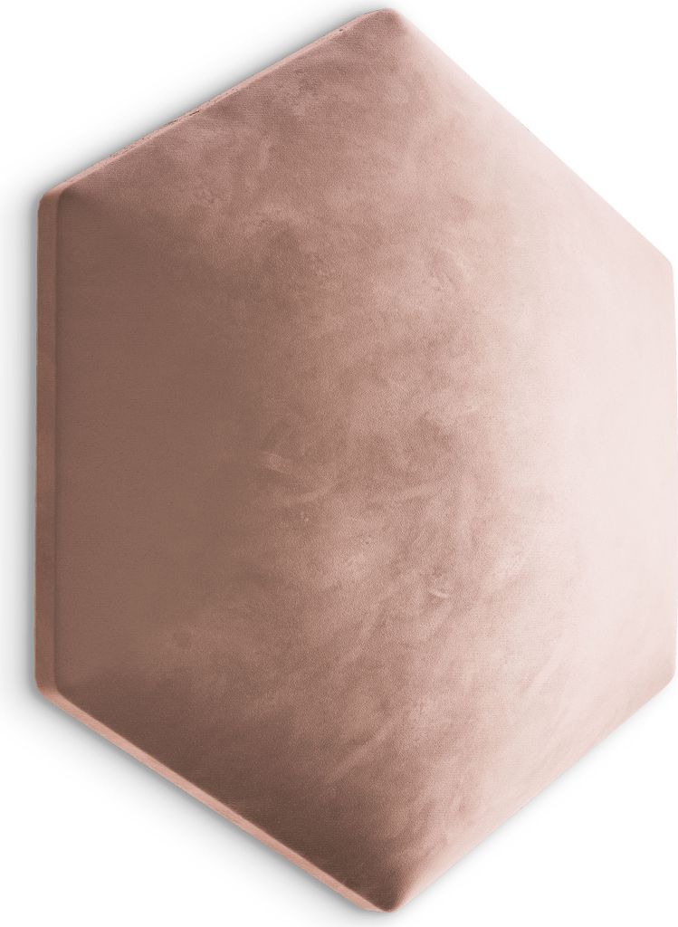 A hexagonal upholstered wall panel in a soft pink velvet.