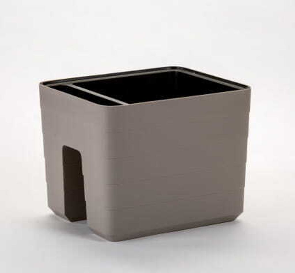 A single beige planter with two compartments against a white background.