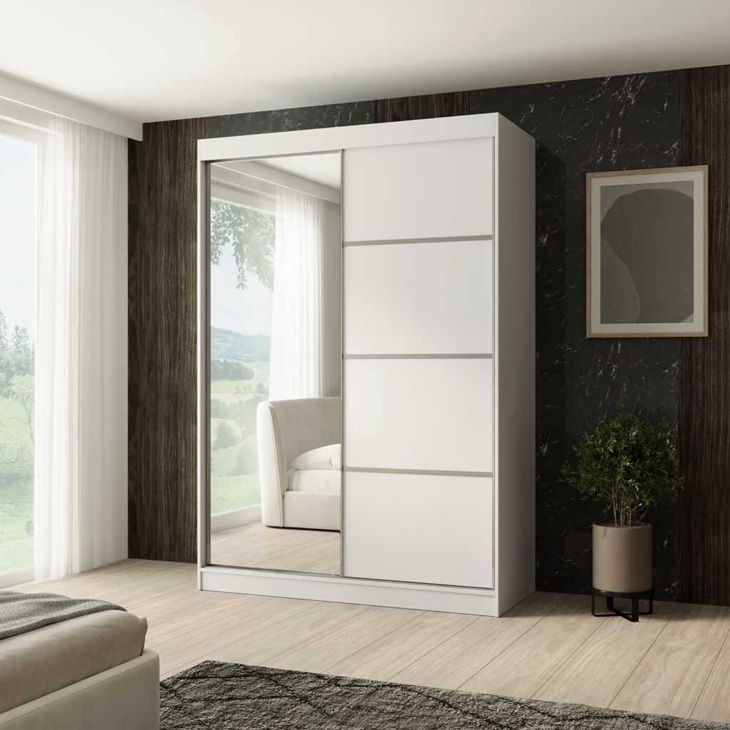 A modern bedroom with a large white sliding door wardrobe with a mirrored door, set against a dark textured wall.