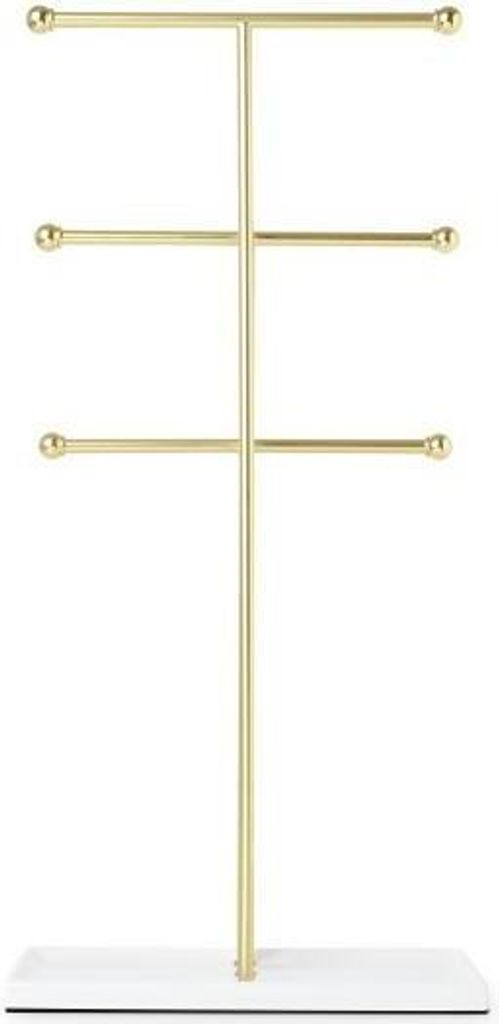 A gold jewelry stand with a white base against a white background.