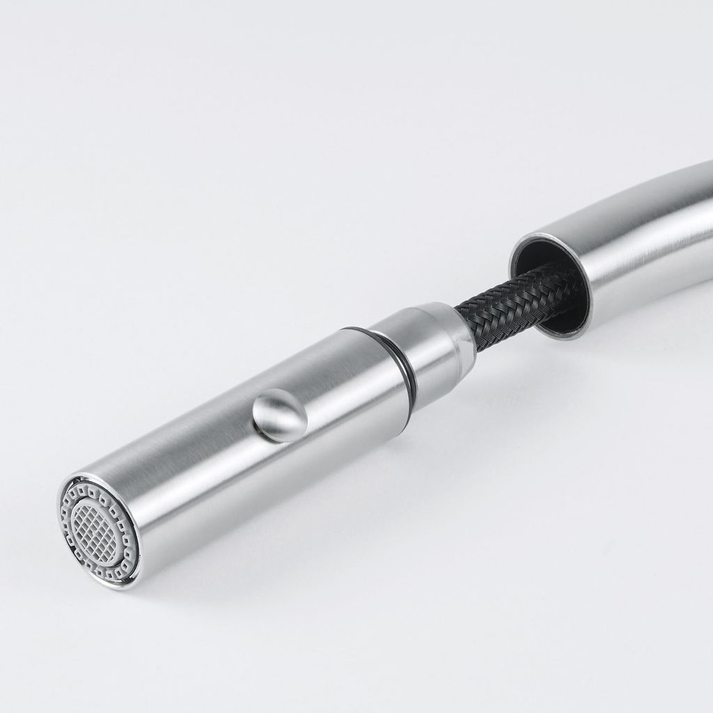 A close-up shot of a kitchen faucet spray head and hose.