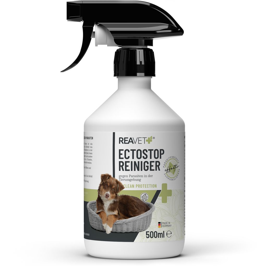 A white spray bottle with a black trigger and cap, featuring a label with text and an image of a puppy in a basket.