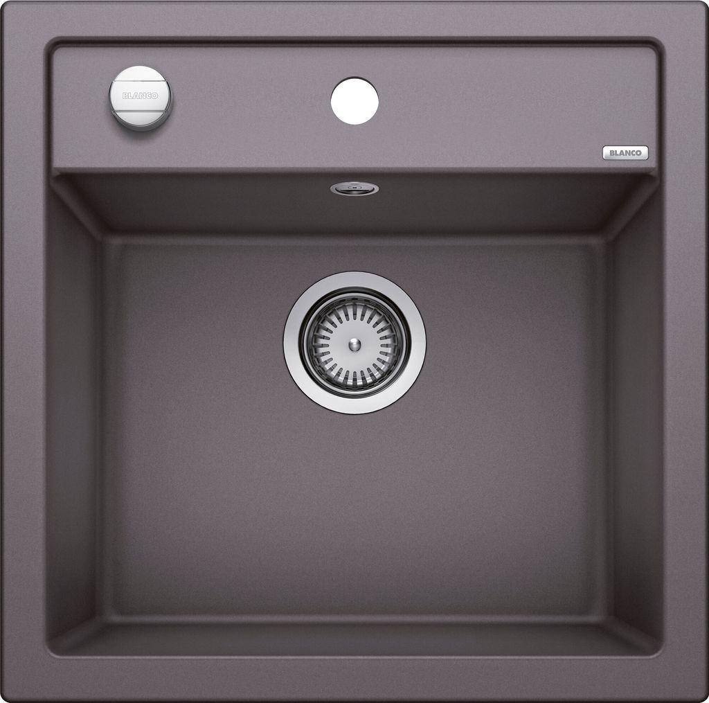 A top-down view of a gray kitchen sink with a drain and faucet holes.