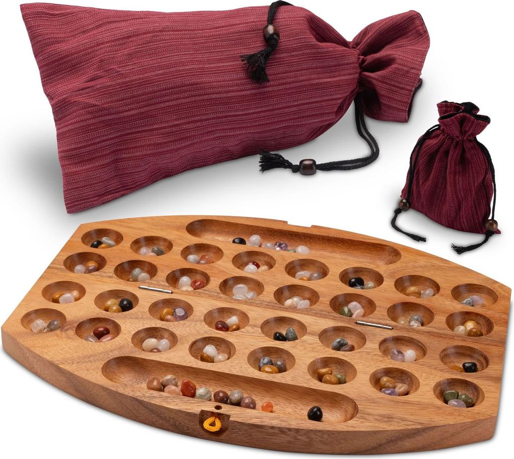 A wooden Bao game board with colorful stones and two fabric bags.
