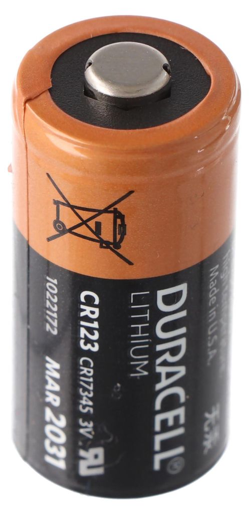 A single Duracell CR123A lithium battery shown in a studio setting.