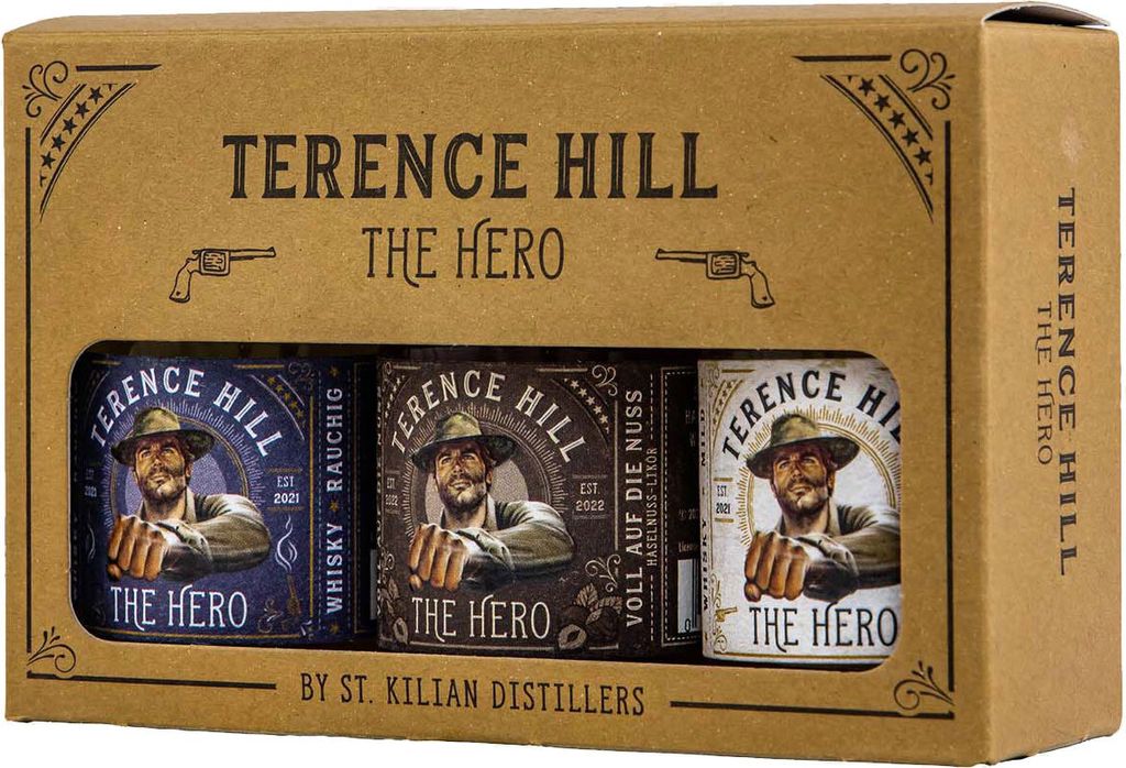 A gift box containing three small bottles of whiskey, branded with 'Terence Hill THE HERO'.