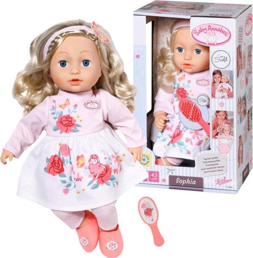 A Baby Annabell Sophia doll in its packaging, with a smaller doll and accessories shown separately.