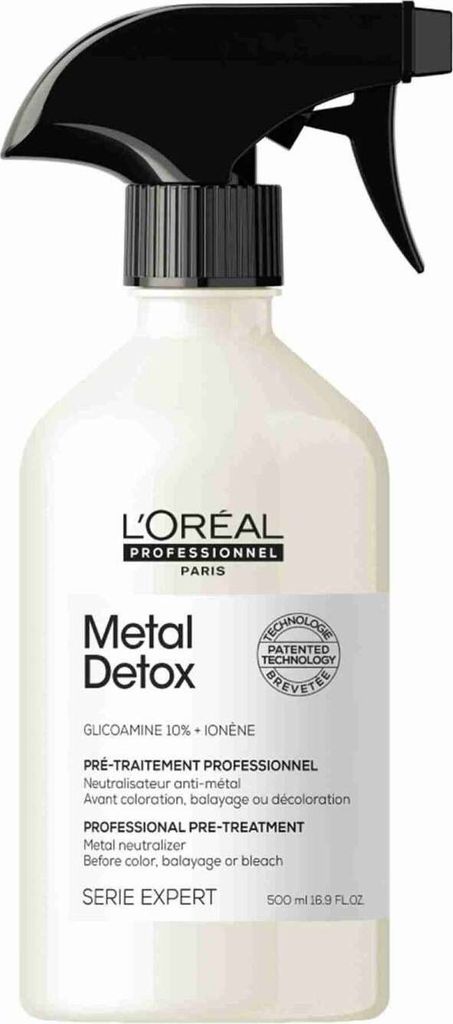 A product shot of a L'Oréal Metal Detox pre-treatment spray bottle.