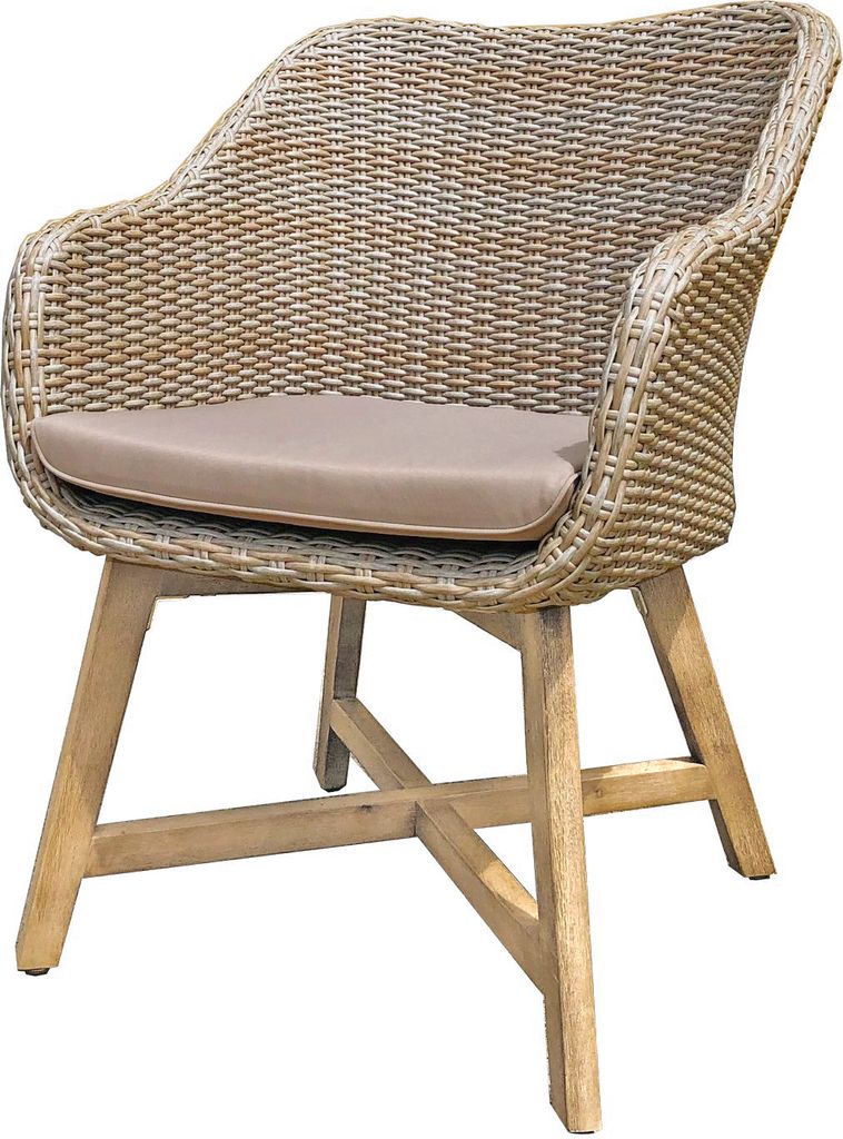 A single wicker chair with a cushion on a white background.