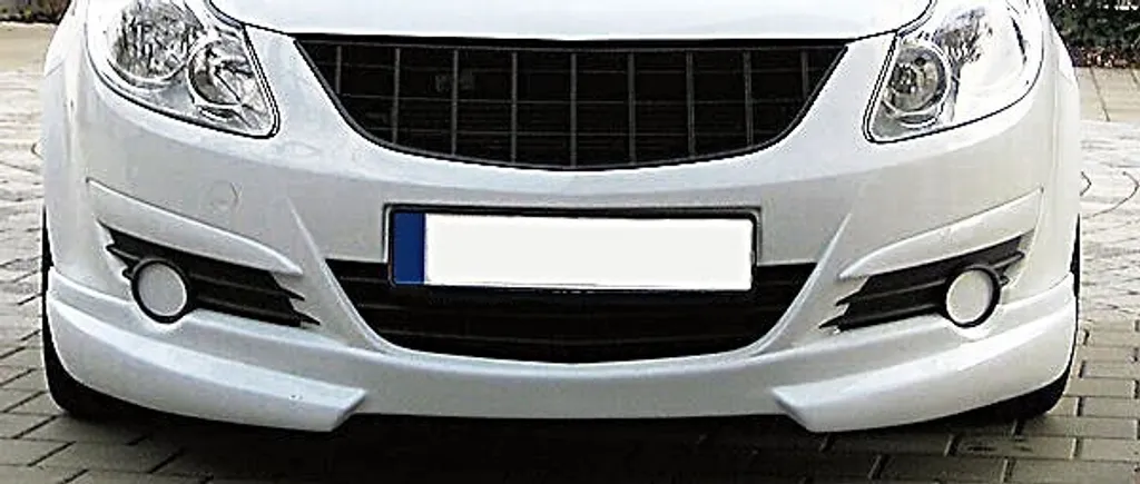 Calandre sans sigle Opel Corsa D 2006 à 2010 finition nid d'abeille